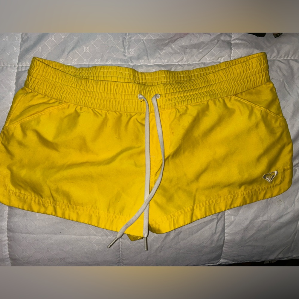 Yellow size 7 Roxy shorts never used